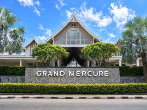a sign for grand mercure in front of a building at Grand Mercure Phuket Patong in Patong Beach
