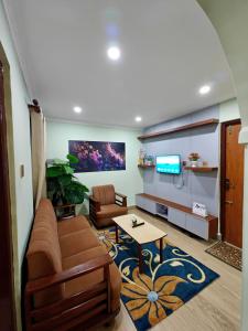 a living room with a couch and a table at Lalitpur stay in Pātan