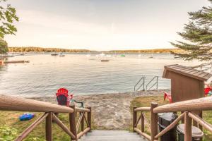 a view of a lake with boats in the water at Amazing All-Season Sprucewold Cabin w/ Private Beach Club Access Dog-friendly in Boothbay Harbor