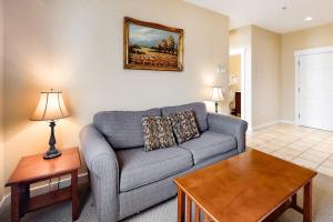 a living room with a couch and a table at Comfortable Suite in Downtown Northeast Harbor w/ WiFi & AC - Walk to the Water in Northeast Harbor