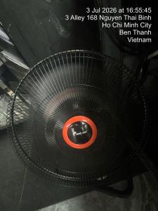 a poster with a picture of a spiral staircase at Snal Spare Hotel in Ho Chi Minh City