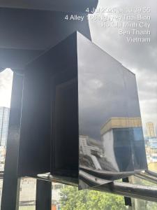a picture of a window with a view of a city at Snal Spare Hotel in Ho Chi Minh City