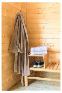 a towel is hanging in a sauna at L'Aurore Céleste in Aywaille +30 photos