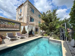 a swimming pool in front of a building at Villa Lido 145 m2 with pool in Krnica