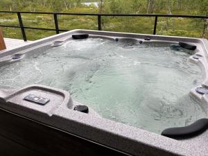 a jacuzziificialificialificialificialificialificialificialificialificialificialificial at Sunrise View Lapland, Jacuzzi and sky view in Kilpisjärvi