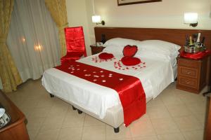 Postelja oz. postelje v sobi nastanitve Hotel Elio