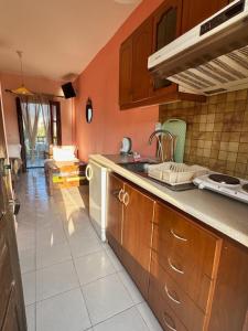 a kitchen with a sink and a counter top at House Nativa in Mola Kalyva +97 photos