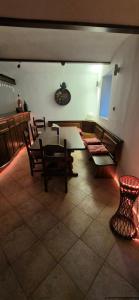 a dining room with a table and chairs in a room at sakura-spa Jesenice in Rakovník