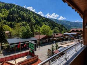 a view of a train station with a mountain at ECRİN OTEL in Uzungöl