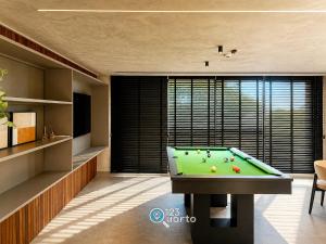 a living room with a pool table in it at Hit Cabo Branco by 123Quarto in João Pessoa