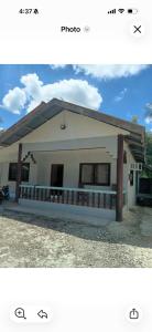 two pictures of a small house with the top picture at Dorz Inn in Basdiot