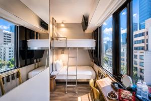 a hotel room with a view of a city at Hotel Relax 5 in Taipei +72 photos