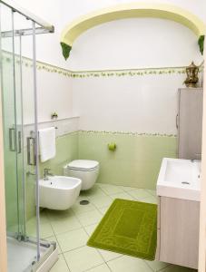 a bathroom with a toilet and a sink and a shower at Il Borgo in Agerola +41 photos