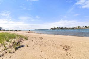 a sandy beach with the ocean in the background at Waterfront Private Beach Gorgeous Views in Yarmouth