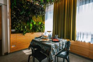 a table in a room with a table and chairs at Apartamento Yumbo Iguazu Luxury in Maspalomas
