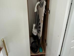 a closet filled with lots of kitchen utensils at Yuzhnaya in Qyzylorda