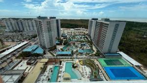 an aerial view of a resort with pools and buildings at Salinas Beach Resort in Salinópolis