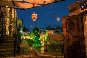 a view of a street at night with a chandelier at Louis Cappadocia in Uçhisar