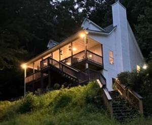 a house on a hill at night with lights at Last house on the hill in Cleveland