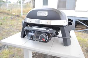 a grill on a table with a camera on it at 静岡 伊豆高原 ペットと泊まれるプライベートヴィラ Tous les doudouトゥレ ドゥドゥ in Ito