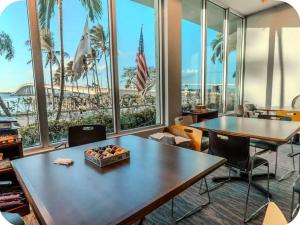 a conference room with a view of the beach at The Caloosa Retreat in Fort Myers