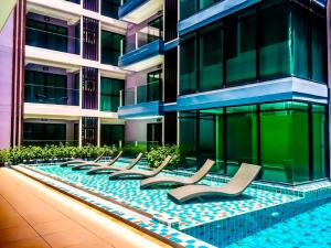 Bazén v ubytovaní Garden Tropical Siam alebo v jeho blízkosti