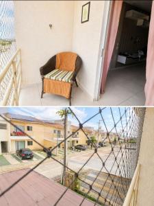 a view from a balcony of a building with a chair at Apartamento em Caruaru 3 quartos completo in Caruaru +2 photos