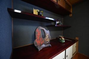 a counter with a vase on top of it at 縁-en- in Zentsuji +61 photos
