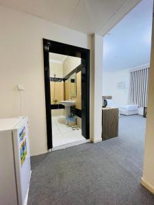 a bathroom with a sink and a toilet in a room at فندق دار العوالي3 in Medina +18 photos