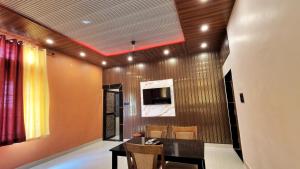 a dining room with a table and chairs at Sand Dunes Stay in Bagru +47 photos
