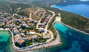 an aerial view of a small island in the water at Sunshine in Skala Marion