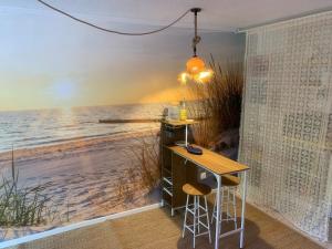 a room with a desk and a view of the ocean at Nyons Riviera in Nyons