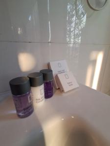 three medicines sitting on top of a bathroom sink at Kasabalı OTEL&BUNGALOW in Bulgurca