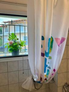 a window with curtains in front of a window at Villa Panorama Sea View Family Villa near Vrachos Beach Lygia in Ligia +38 photos