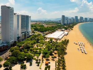 an aerial view of a beach and buildings at Ruby Luxury Hotel in Nha Trang