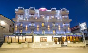a large building with lights on top of it at Hotel Gaggiano in San Giovanni Rotondo