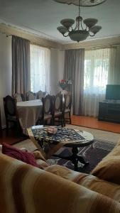 a living room with a couch and a table at Sanahin in Alaverdi