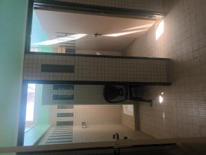 a view of a bathroom with a sink and a mirror at Grande caravane in Gergy