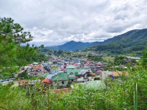 a view of a small town in the mountains at Mountain Lodge within Town Proper! in Sagada