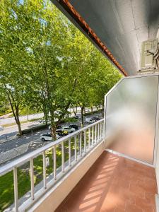 an open balcony with a view of a street at Arcádia by Umbral in Fátima