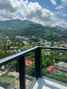 a view of a city from a balcony at Thom Tower in Gonio