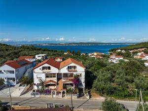 an aerial view of a house in a town at Villa Bosotina Royal Sea View in Kukljica