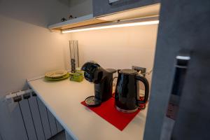 a coffee maker on a counter in a kitchen at Ca' di Sara in Domodossola