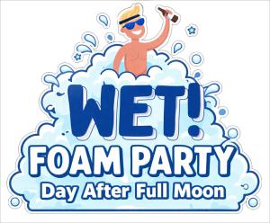 a boy in a wave pool with a cue in his hand at WET Pool Party Haad Rin in Haad Rin