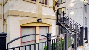 a building with a wrought iron fence in front of a window at Fully Furnished Apartment in Washington near Logan Circle in Washington