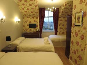 Cama o camas de una habitación en Thornfield Guest Residence
