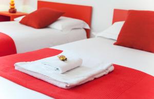 Postel nebo postele na pokoji v ubytování B&B Botton D'Oro 2