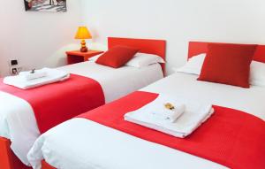 Postel nebo postele na pokoji v ubytování B&B Botton D'Oro 2