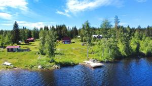 a small island in the middle of a river at Sodra Fullsjön in Stugun