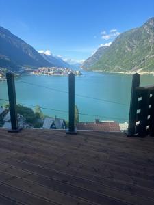 a view of a lake from a roof at Basement apartment in Tokheim +6 photos